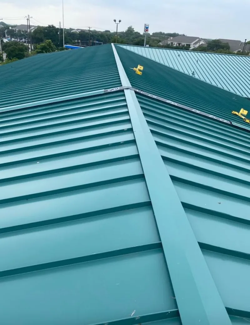 Green commercial metal roof ridge and valley for Metal Roof Repair in Eucalyptus Hills