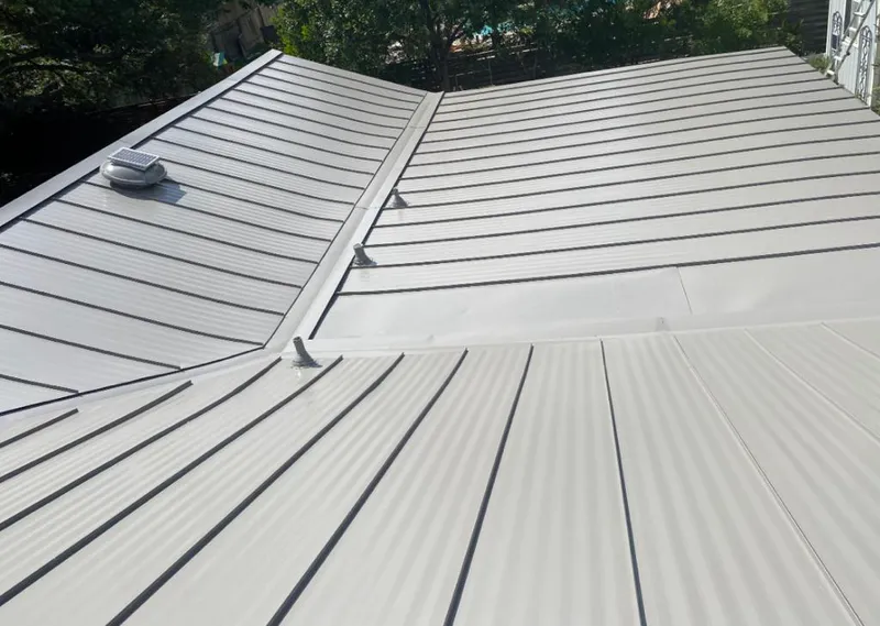 Solar attic fan installed on a metal roof for Roof Ventilation in Eucalyptus Hills
